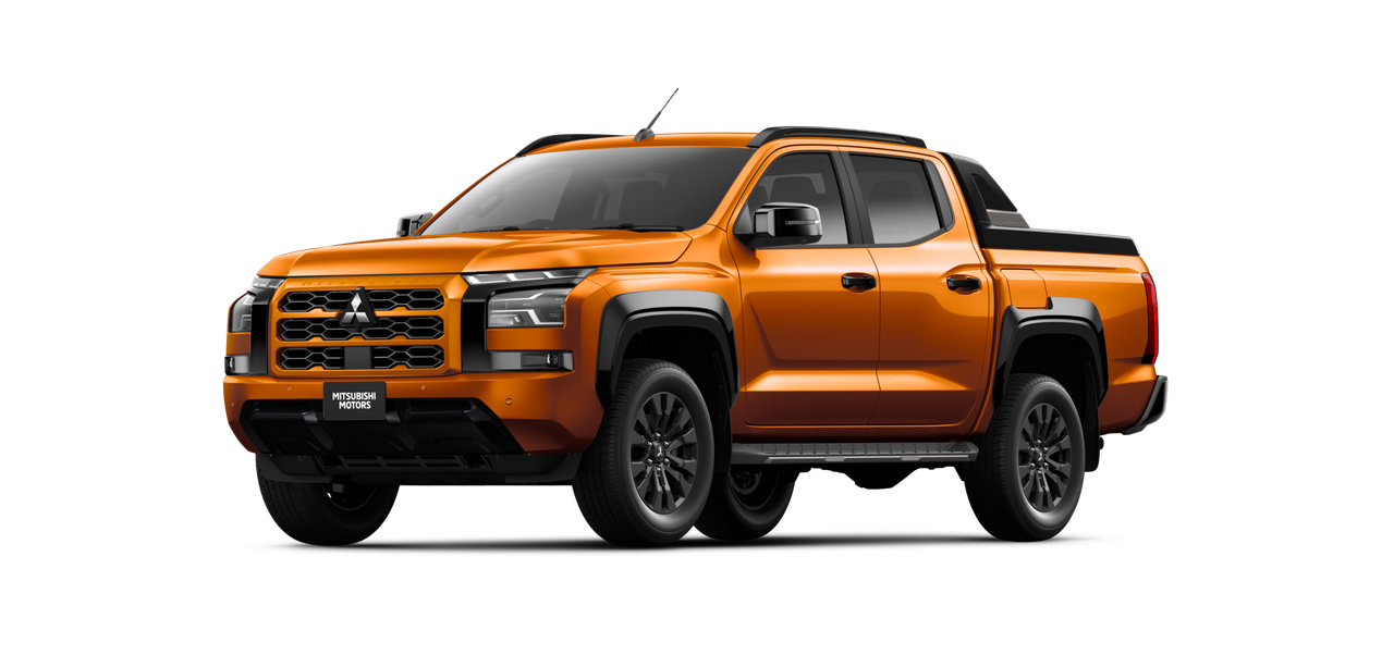 Mitsubishi L200 cor de laranja, de três quartos de frente