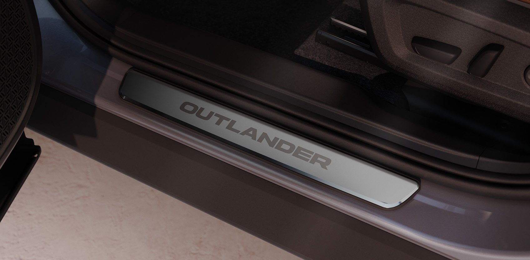 Proteção da embaladeira iluminada na porta de um Outlander